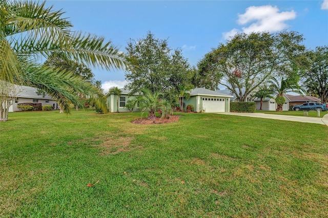 view of yard with a garage