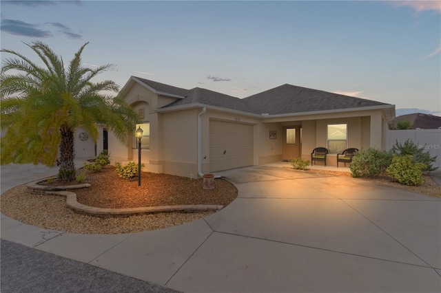 view of front of home with a garage