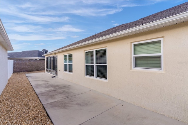 view of home's exterior with a patio area