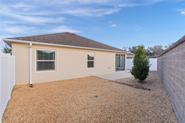 rear view of house with a patio area