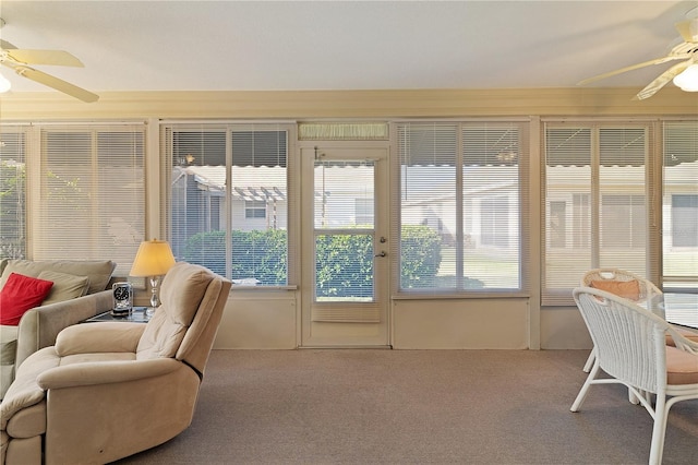 sunroom with ceiling fan