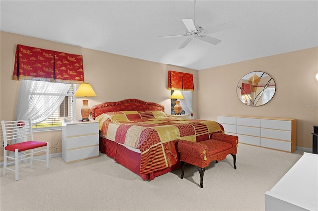 carpeted bedroom with baseboards and a ceiling fan