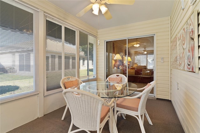 sunroom / solarium with ceiling fan and plenty of natural light
