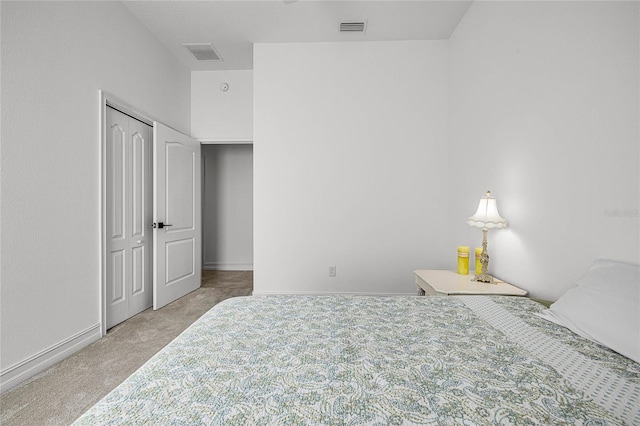 carpeted bedroom with a closet