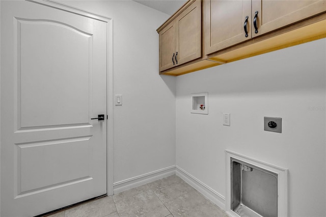 laundry area featuring hookup for an electric dryer, washer hookup, cabinets, and light tile patterned flooring