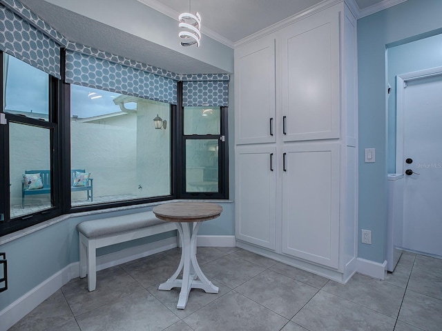 bathroom featuring tile patterned floors and ornamental molding