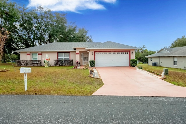 single story home featuring a garage, central air condition unit, and a front lawn