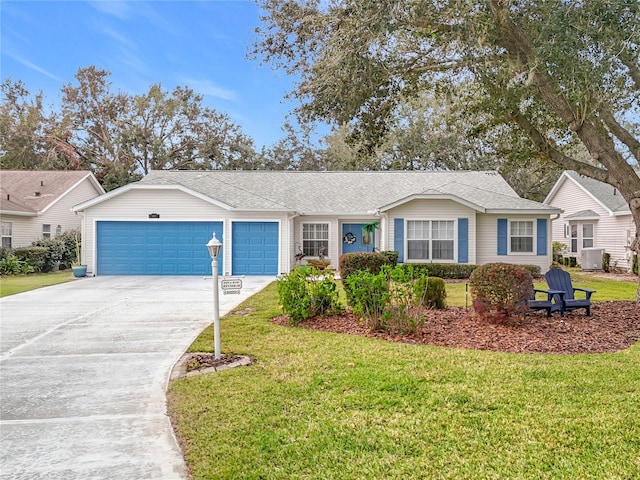 single story home with a garage and a front yard