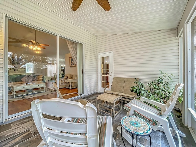 sunroom / solarium with lofted ceiling