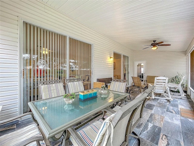 view of patio featuring ceiling fan