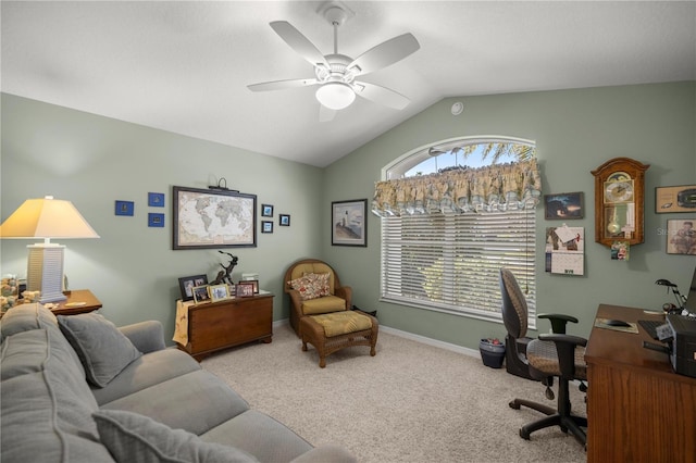 carpeted office space featuring ceiling fan and lofted ceiling