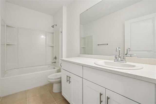 full bathroom with washtub / shower combination, tile patterned floors, vanity, and toilet