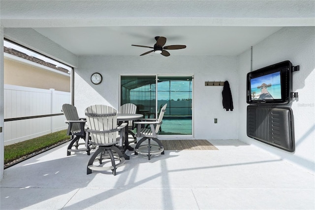 view of patio / terrace featuring ceiling fan