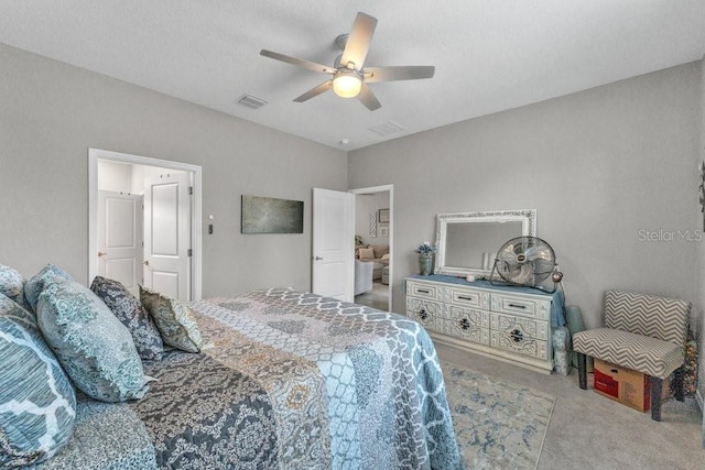 carpeted bedroom featuring ceiling fan