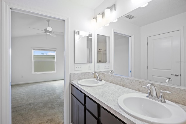 bathroom with vanity and ceiling fan