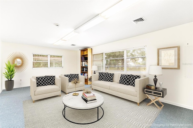 living room featuring plenty of natural light