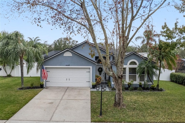 ranch-style house with a front lawn and a garage