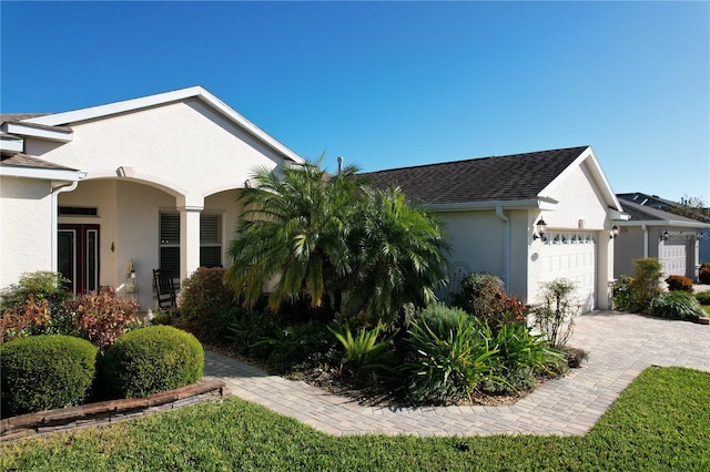 view of front of property with a garage