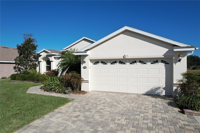 single story home featuring a garage