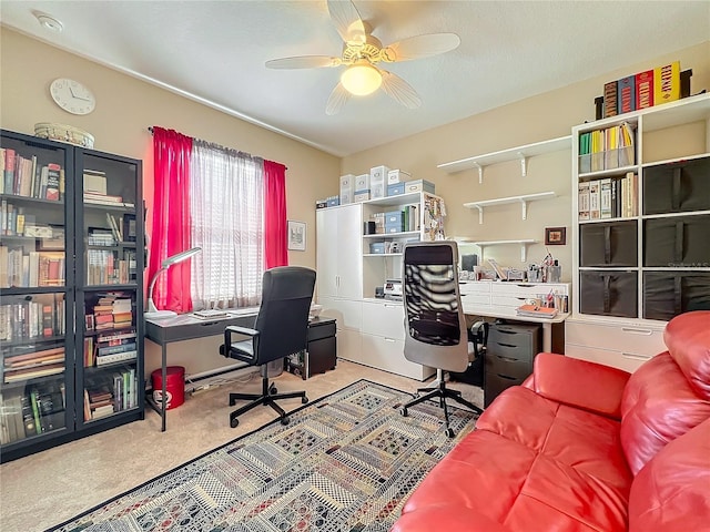 office area with light carpet and ceiling fan