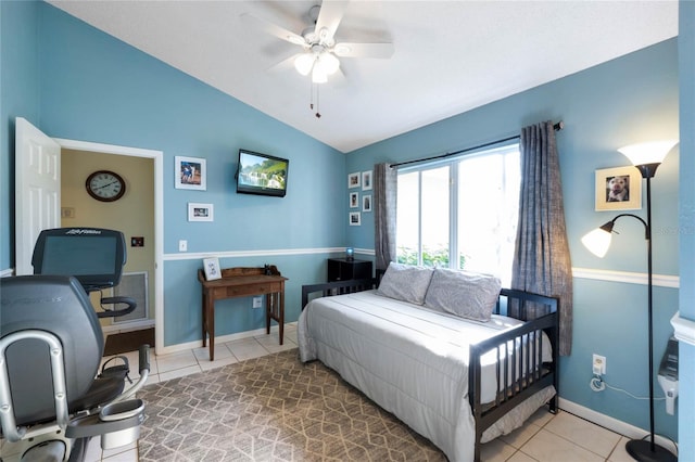 bedroom featuring ceiling fan, tile patterned flooring, and vaulted ceiling