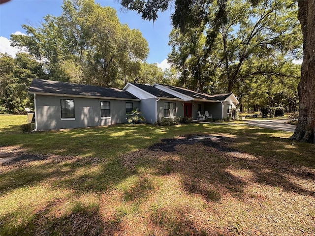 back of house with a yard