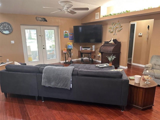 living room with ceiling fan, vaulted ceiling, wood-type flooring, and french doors