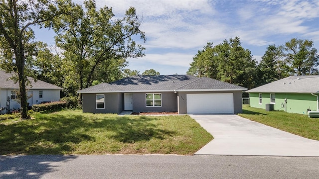 single story home featuring central AC, a front yard, and a garage