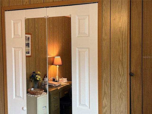 interior details featuring wooden walls