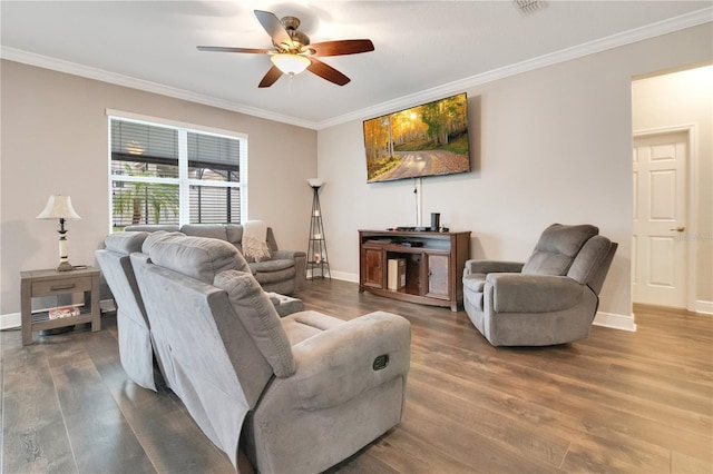 living room with crown molding, hardwood / wood-style floors, and ceiling fan