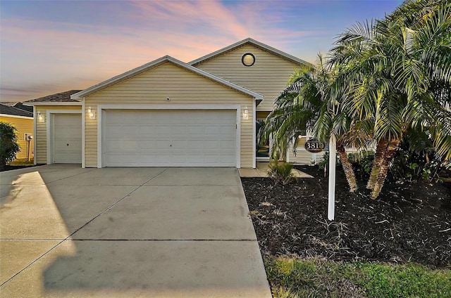 single story home with a garage