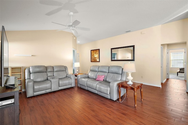 living room featuring ceiling fan, lofted ceiling, and dark wood-type flooring