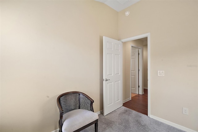 living area with carpet flooring