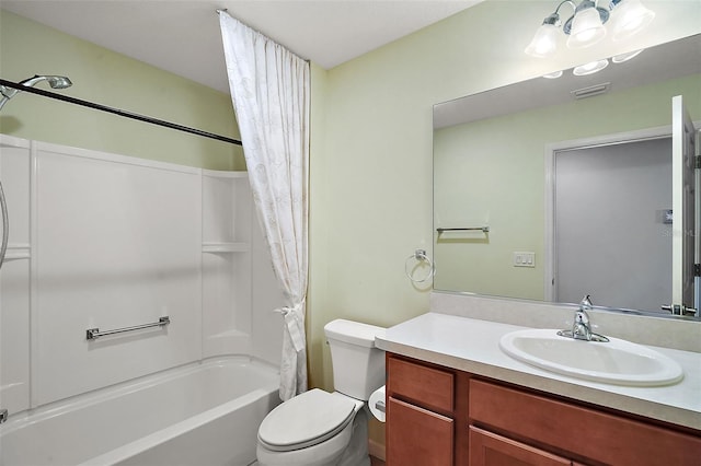 full bathroom with vanity, toilet, and shower / bath combo with shower curtain