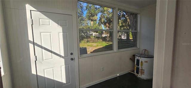 doorway to outside with water heater