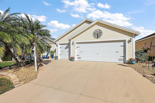 single story home featuring a garage