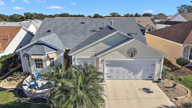 1757 Landrum Ln, The Villages, FL 32162 - view of front of home featuring a garage