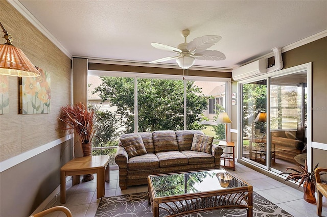 sunroom featuring ceiling fan and a wall mounted air conditioner