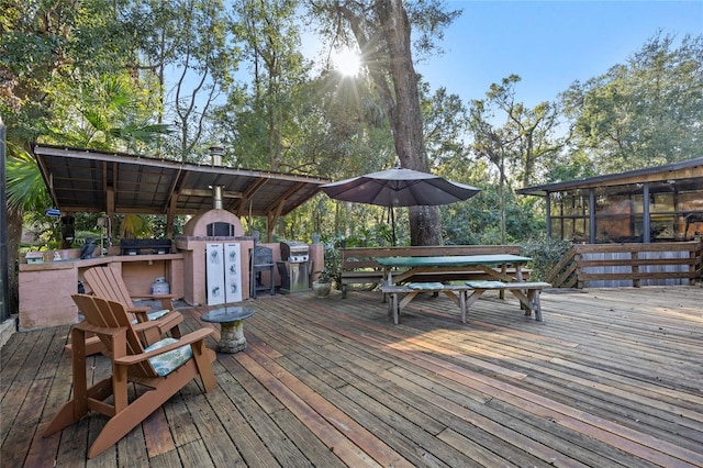 deck featuring a sunroom