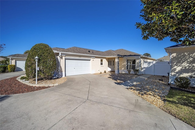 single story home featuring a garage