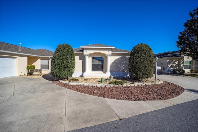 view of front of property with a garage