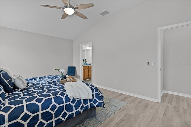 bedroom with ceiling fan, lofted ceiling, and light hardwood / wood-style floors