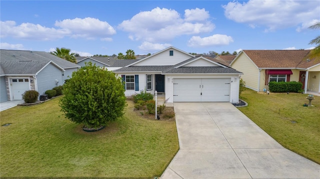 single story home with a garage and a front lawn