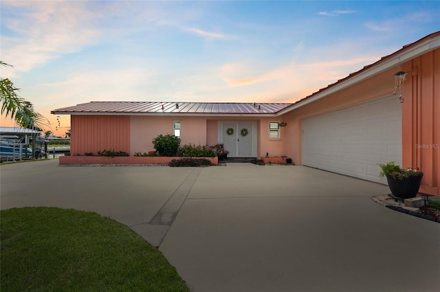 ranch-style home with a garage