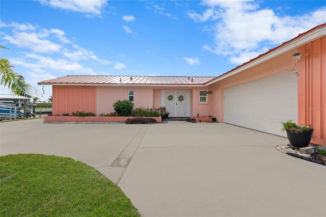 single story home featuring a garage