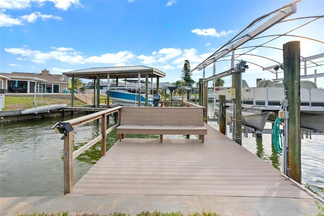 dock area with a water view