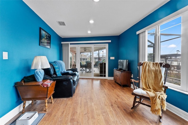 sitting room featuring light wood-type flooring