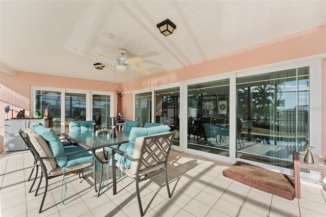 view of patio featuring ceiling fan