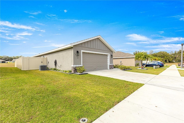 view of front of property with cooling unit and a front lawn