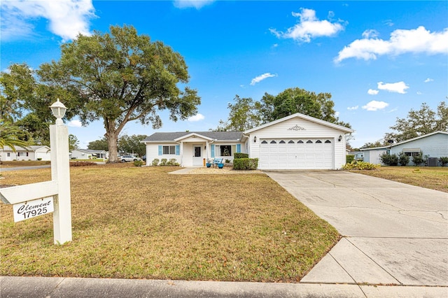 ranch-style house with a garage and a front yard